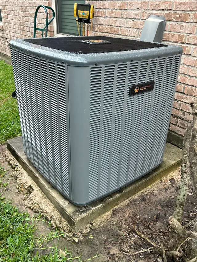 Air City branded nameplate on a serviced outdoor condenser unit